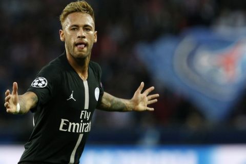 PSG forward Neymar Neymar celebrates after scoring the opening goal of his team during the Champions League Group C soccer match between Paris Saint-Germain and Red Star at Parc des Prince stadium in Paris, Wednesday, Oct. 3, 2018. (AP Photo/Thibault Camus)