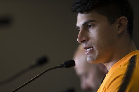 Roma's Diego Perotti talks to journalists during a news conference at the Wanda Metropolitano stadium in Madrid, Tuesday, Nov. 21, 2017. Roma will play a Champions League group C soccer match against Atletico Madrid on Wednesday. (AP Photo/Francisco Seco)
