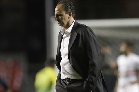 Coach Rogerio Ceni of Brazil's Sao Paulo leaves the field at the end of a Copa Sudamericana soccer match against Argentina's Defensa y Justicia , in Sao Paulo, Brazil, Thursday, May 11, 2017. The match ended 1-1 on aggregate and Defensa y Justicia classified for the next round due to an away goal. (AP Photo/Andre Penner)