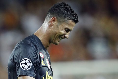 Juventus forward Cristiano Ronaldo reacts after receiving a red card during the Champions League, group H soccer match between Valencia and Juventus, at the Mestalla stadium in Valencia, Spain, Wednesday, Sept. 19, 2018. (AP Photo/Alberto Saiz)