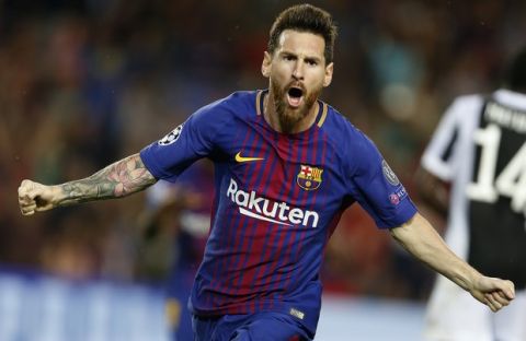 Barcelona's Lionel Messi celebrates scoring his side's first goal during a Champions League group D soccer match between FC Barcelona and Juventus at the Camp Nou stadium in Barcelona, Spain, Tuesday, Sept. 12, 2017. (AP Photo/Francisco Seco)