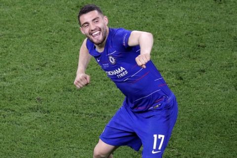 Chelsea's Mateo Kovacic celebrates after his team's 4-1 win in the Europa League Final soccer match between Chelsea and Arsenal at the Olympic stadium in Baku, Azerbaijan, Wednesday, May 29, 2019. (AP Photo/Dmitri Lovetsky)