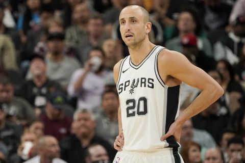 San Antonio Spurs guard Manu Ginobili, of Argentina, walks upcourt during the second half of an NBA basketball game against the Los Angeles Clippers, Tuesday, Nov. 7, 2017, in San Antonio. San Antonio won 120-107. (AP Photo/Darren Abate)
