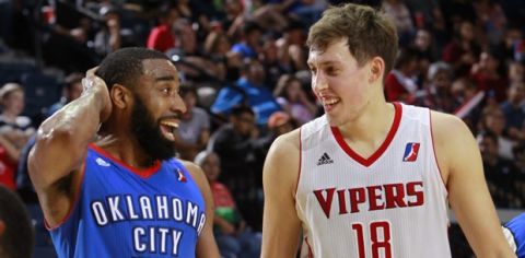 HIDALGO, TX - April 13: Reggie Williams #55 of the Oklahoma City Blue and Kyle Wiltjer #18 of the Rio Grande Valley Vipers laugh during a break in action during the first game of the Western Conference Finals of the NBA D-League at the State Farm Arena April 13, 2017 in Hidalgo, Texas. (NOTE TO USER: User expressly acknowledges and agrees that, by downloading and/or using this Photograph, user is consenting to the terms and conditions of the  Getty Images License Agreement. Mandatory Copyright Notice: Copyright 2017 NBAE (Photo by Nathan Lambrecht/NBAE via Getty Images)
