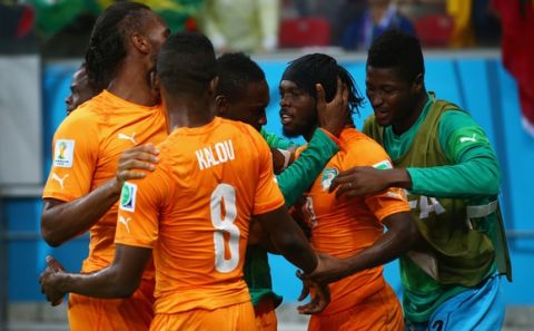 RECIFE, BRAZIL - JUNE 14:  Gervinho of the Ivory Coast (2nd R) celebrates with teammates after scoring his team's second goal during the 2014 FIFA World Cup Brazil Group C match  between the Ivory Coast and Japan at Arena Pernambuco on June 14, 2014 in Recife, Brazil.  (Photo by Mark Kolbe/Getty Images)
