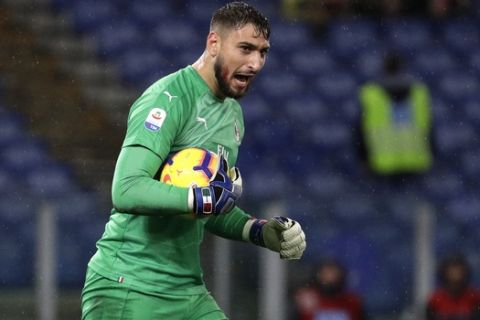 FILE - In this Sunday, Nov. 25, 2018 file photo, AC Milan goalkeeper Gianluigi Donnarumma reacts during a Serie A soccer match between Lazio and AC Milan, at the Rome Olympic stadium. Donnarumma has been a mainstay between the posts for Milan since making his debut in 2015 and has made more than 150 appearances for the club as well as also playing for the Italy national team. It is sometimes easy to forget how young he is. He turned 20 on Monday. "Donnarumma is incredible, I wished him happy birthday earlier," said Adriano Galliani, who was Milan CEO when the young goalkeeper broke through. "To think he has played more than 150 matches for Milan at the age of 20 is extraordinary. (AP Photo/Gregorio Borgia, File)