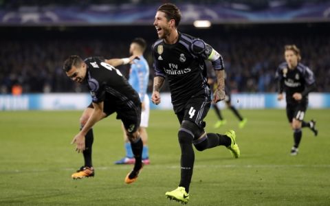 Real Madrid's Sergio Ramos celebrates after scoring his side's second goal during the Champions League round of 16, second leg, soccer match between Napoli and Real Madrid at the San Paolo stadium in Naples, Italy, Tuesday March 7, 2017. (AP Photo/Andrew Medichini)