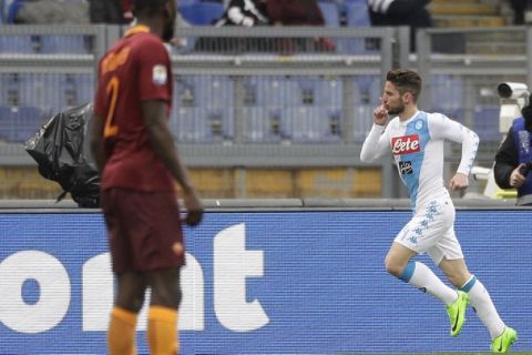 Napoli's Dries Mertens, right, celebrates after scoring during a Serie A soccer match between Roma and Napoli, at the Rome Olympic stadium, Saturday, March 4, 2017. (AP Photo/Gregorio Borgia)