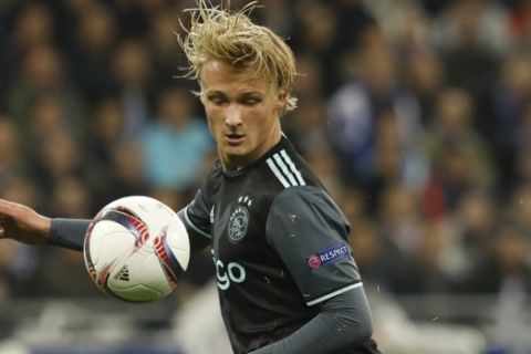 Ajax's Kasper Dolberg controls the ball during the second leg semi final soccer match between Olympique Lyon and Ajax in the Stade de Lyon, Decines, France, Thursday, May 11, 2017. (AP Photo/Laurent Cipriani)