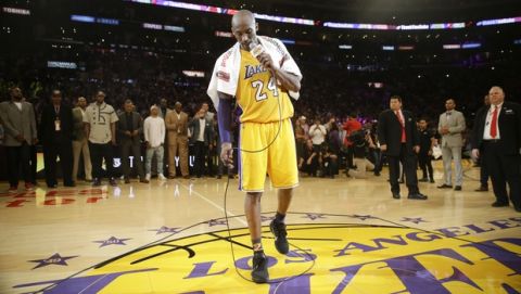 Los Angeles Lakers' Kobe Bryant looks downward while speaking after the last NBA basketball game of his career, against the Utah Jazz on Wednesday, April 13, 2016, in Los Angeles. Bryant scored 60 points as the Lakers won 101-96. (AP Photo/Jae C. Hong)