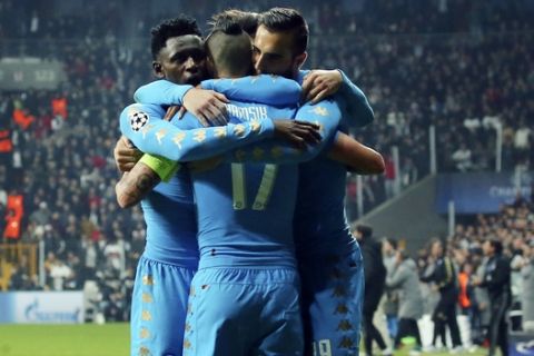 Napoli players celebrate with their captain Marek Hamsik, center, after he scored against Besiktas during a Champions League group B soccer match, in Istanbul, Tuesday, Nov. 1, 2016. (AP Photo)