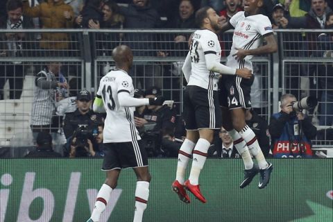 Besiktas' scorer Talisca, right, and his teammate celebrate their side's first goal during the Champions League Groug G soccer match between Besiktas Istanbul and FC Porto in Istanbul, Turkey, Tuesday, Nov. 21, 2017. (AP Photo/Lefteris Pitarakis)