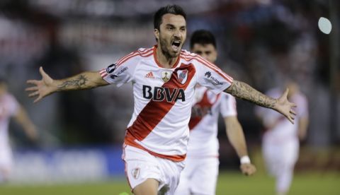 Striker Ignacio Scocco of Argentina's River Plate celebrates after scoring during a Copa Libertadores soccer game against Paraguay's Guarani in Asuncion, Paraguay, Tuesday, July 4, 2017. (AP Photo/Jorge Saenz)