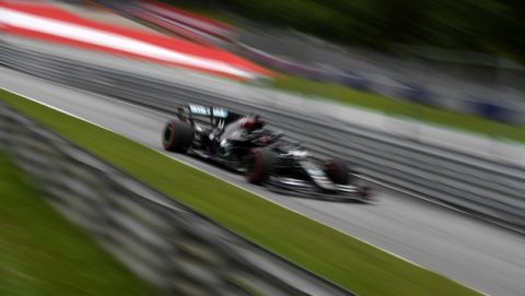 In this image taken with a slow shutter speed, Mercedes driver Lewis Hamilton of Britain steers his car during the first practice session at the Red Bull Ring racetrack in Spielberg, Austria, Friday, July 3, 2020. The Austrian Formula One Grand Prix will be held on Sunday. (Joe Klamar/Pool via AP)