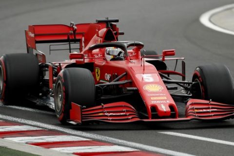 Ferrari driver Sebastian Vettel of Germany steers his car during the qualifying session for the Hungarian Formula One Grand Prix at the Hungaroring racetrack in Mogyorod, Hungary, Saturday, July 18, 2020. The Hungarian F1 Grand Prix will be held on Sunday. (Darko Bandic/Pool)