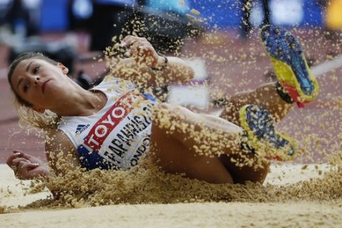 Greece's Paraskevi Papahristou makes an attempt in the women's triple jump qualification during the World Athletics Championships in London Saturday, Aug. 5, 2017. (AP Photo/Matthias Schrader)