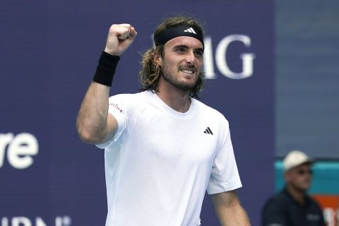 Stefanos Tsitsipas of Greece reacts after defeating Cristian Garin of Chile in three sets during the Miami Open tennis tournament, Monday, March 27, 2023, in Miami Gardens, Fla. (AP Photo/Marta Lavandier)