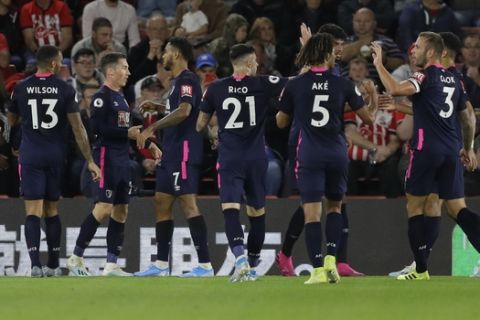 Bournemouth's Harry Wilson, second left, celebrates with teammates after scoring his side's opening goal during the English Premier League soccer match between Southampton and Bournemouth at St Mary's stadium in Southampton, England, Friday, Sept. 20, 2019. (AP Photo/Kirsty Wigglesworth)