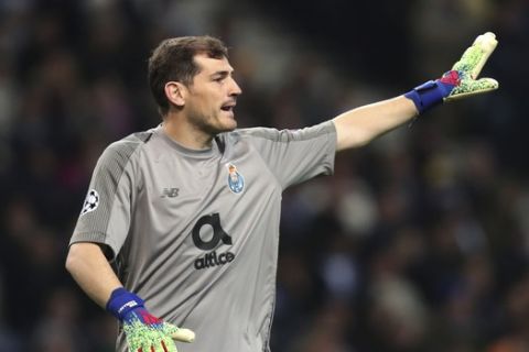 Porto goalkeeper Iker Casillas gestures during the Champions League round of 16, 2nd leg, soccer match between FC Porto and AS Roma at the Dragao stadium in Porto, Portugal, Wednesday, March 6, 2019. (AP Photo/Luis Vieira)