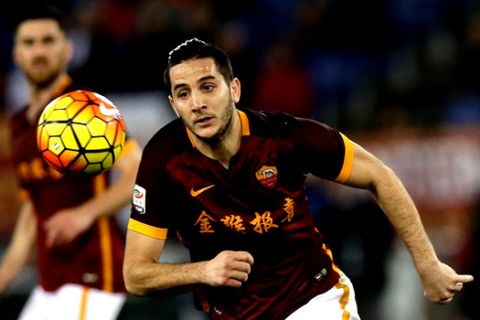 Romas Kostas Manolas wears the team jersey bearing a Chinese writing which reads: "The golden Monkey brings happiness and fortune " to greet the upcoming Chinese New Year , during a Serie A soccer match between Roma and Sampdoria at Rome's Olympic stadium, Sunday, Feb. 7, 2016.  The Lunar New Year which falls on Feb. 8 this year marks the Year of the Monkey in the Chinese calendar. (AP Photo/Alessandra Tarantino)