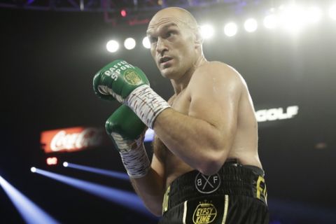 Tyson Fury, of England, fights Deontay Wilder, not pictured, during a WBC heavyweight championship boxing match Saturday, Feb. 22, 2020, in Las Vegas. (AP Photo/Isaac Brekken)