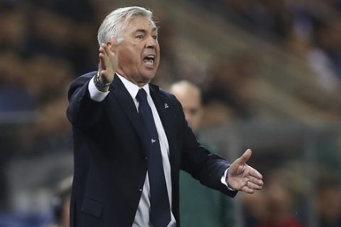Napoli head coach Carlo Ancelotti gives instructions during a Champions League group E soccer match between Genk and Napoli at the KRC Genk Arena in Genk, Belgium, Wednesday, Oct. 2, 2019. (AP Photo/Francisco Seco)