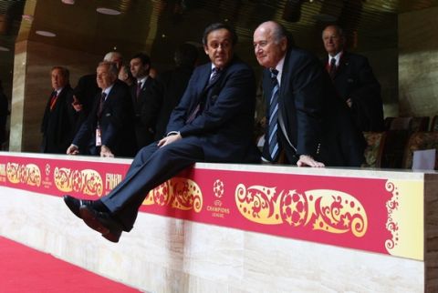 MOSCOW - MAY 21:  Michel Platini (L), president of UEFA and Sepp Blatter (R), the FIFA president chat with one another after the UEFA Champions League Final match between Manchester United and Chelsea at the Luzhniki Stadium on May 21, 2008 in Moscow, Russia.  (Photo by Michael Steele/Getty Images)