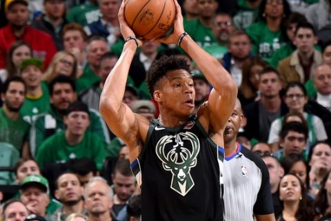 BOSTON, MA - APRIL 17:  Giannis Antetokounmpo #34 of the Milwaukee Bucks looks to pass the ball against the Boston Celtics in Game Two of Round One of the 2018 NBA Playoffs on April 17, 2018 at TD Garden in Boston, Massachusetts. NOTE TO USER: User expressly acknowledges and agrees that, by downloading and or using this Photograph, user is consenting to the terms and conditions of the Getty Images License Agreement. Mandatory Copyright Notice: Copyright 2018 NBAE (Photo by Brian Babineau/NBAE via Getty Images)