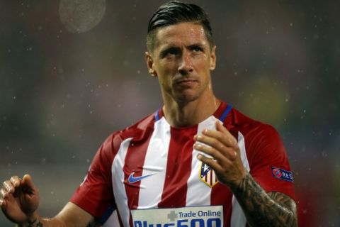 Atletico's Fernando Torres looks dejected at the end of a Champions League semifinal, 2nd leg soccer match between Atletico de Madrid and Real Madrid, in Madrid, Spain, Wednesday, May 10, 2017 . (AP Photo/Daniel Ochoa de Olza)
