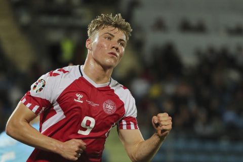 Denmark's Rasmus Hojlund celebrates after scoring his side's opening goal during the Euro 2024 group H qualifying soccer match between San Marino and Denmark at the San Marino Stadium in Serravalle, San Marino, Tuesday, Oct. 17, 2023. (AP Photo/Felice Calabro)