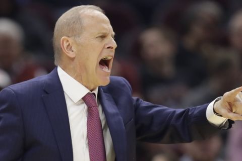 Cleveland Cavaliers head coach John Beilein yells instructions to players in the first half of an NBA basketball game against the New York Knicks, Monday, Jan. 20, 2020, in Cleveland. (AP Photo/Tony Dejak)