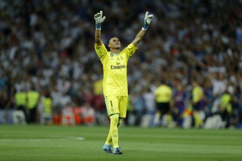 Real Madrid's goalkeeper Keylor Navas celebrates his side's second goal against Barcelona during the Spanish Super Cup second leg soccer match between Real Madrid and Barcelona at the Santiago Bernabeu stadium in Madrid, Wednesday, Aug. 16, 2017. (AP Photo/Francisco Seco)