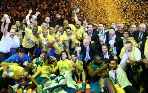 MILAN, ITALY - MAY 18: Players of Maccabi Electra Tel Aviv pose with the tophy after winning over Real Madrid at the Turkish Airlines Euroleague Final Four 2014 Champions at Mediolanum Forum on May 18, 2014 in Milan, Italy. (Photo by Evren Atalay/Anadolu Agenchy/Getty Images)