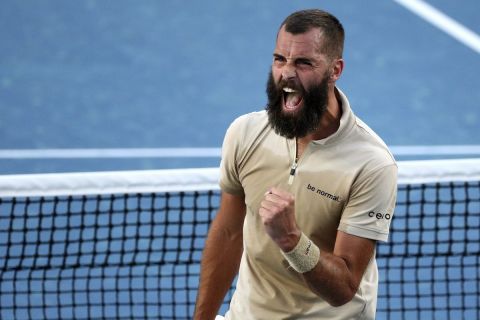 Benoit Paire of France reacts after winning a point against Grigor Dimitrov of Bulgaria during their second round match at the Australian Open tennis championships in Melbourne, Australia, Thursday, Jan. 20, 2022. (AP Photo/Tertius Pickard)