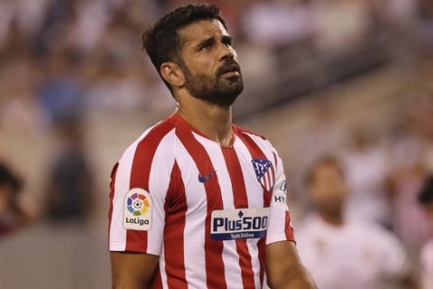 Atletico Madrid forward Diego Costa reacts after a shot on goal during the first half of an International Champions Cup soccer match against Real Madrid, Friday, July 26, 2019, in East Rutherford, N.J. Atletico Madrid won 7-3. (AP Photo/Steve Luciano)