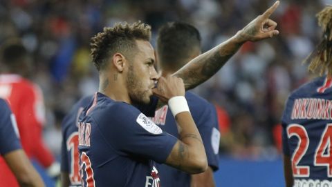 PSG's Neymar celebrates the opening goal during their League One soccer match between Paris Saint-Germain and Caen at Parc des Princes stadium in Paris, Sunday, Aug. 12, 2018. (AP Photo/Michel Euler)