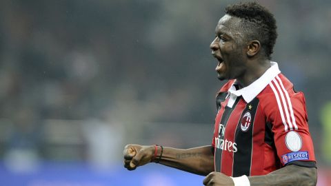 MILAN, ITALY - FEBRUARY 20:  Sulley Muntari of AC Milan celebrates victory at the end of the UEFA Champions League Round of 16 first leg match between AC Milan and Barcelona at San Siro Stadium on February 20, 2013 in Milan, Italy.  (Photo by Claudio Villa/Getty Images)