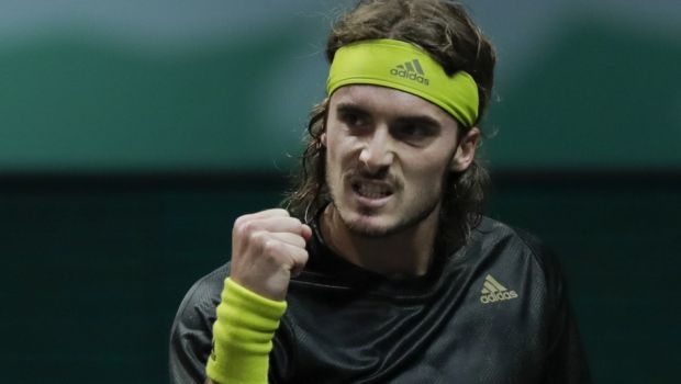 Greece's Stefanos Tsitsipas clenches his fist after scoring a point against Poland's Hubert Hurkacz in their second round men's singles match of the ABN AMRO world tennis tournament at Ahoy Arena in Rotterdam, Netherlands, Thursday, March 4, 2021. (AP Photo/Peter Dejong)