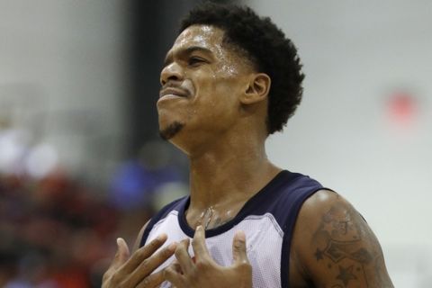 Washington Wizards' Jarell Eddie reacts after a play against the Atlanta Hawks during the second half of an NBA summer league basketball game, Sunday, July 10, 2016, in Las Vegas. (AP Photo/John Locher)