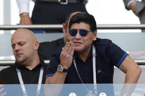 Argentinian soccer legend Diego Armando Maradona gestures during the round of 16 match between France and Argentina, at the 2018 soccer World Cup at the Kazan Arena in Kazan, Russia, Thursday, June 28, 2018. (AP Photo/Ricardo Mazalan)