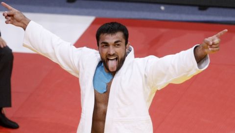 Ilias Iliadis of Greece reacts after defeating Daiki Nishiyama of Japan during their men's under 90kg category final match at the World Judo Championships in Paris Friday, Aug. 26, 2011. Iliadis won gold. (AP Photo/Michel Spingler)