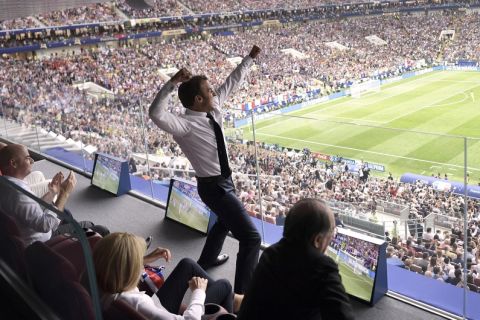 French President Emmanuel Macron cheers during the final match between France and Croatia at the 2018 soccer World Cup in the Luzhniki Stadium in Moscow, Russia, on July 15, 2018. (Alexei Nikolsky/Sputnik/Kremlin Pool Photo via AP)