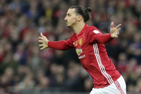 United's Zlatan Ibrahimovic celebrates after scoring the opening goal during the English League Cup final soccer match between Manchester United and Southampton FC at Wembley stadium in London, Sunday, Feb. 26, 2017. (AP Photo/Tim Ireland)