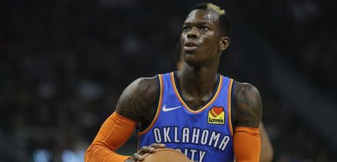 Oklahoma City Thunder's Dennis Schroder shoots a free throw during the first half of an NBA basketball game against the Milwaukee Bucks Wednesday, April 10, 2019, in Milwaukee. (AP Photo/Aaron Gash)