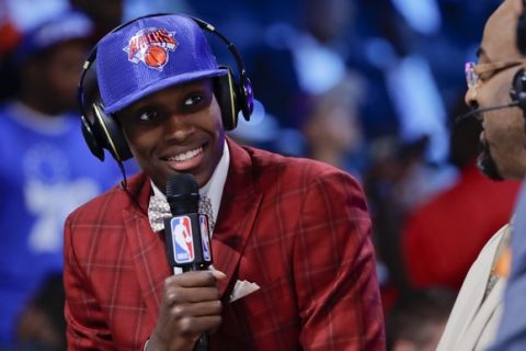 Frank Ntilikina answers questions during an interview after being selected by the New York Knicks as the eighth pick overall during the NBA basketball draft, Thursday, June 22, 2017, in New York. (AP Photo/Frank Franklin II)