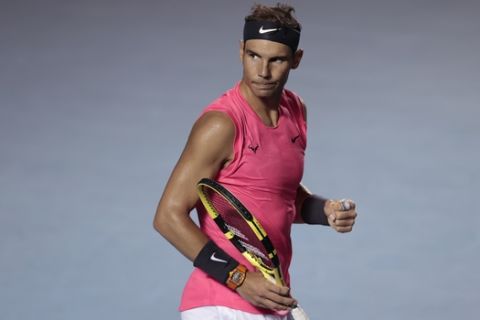 Spain's Rafael Nadal pumps his fist as he defeats Spain's Pablo Andujar in the opening round of the Mexican Open tennis tournament in Acapulco, Mexico, Tuesday, Feb. 25, 2020. (AP Photo/Rebecca Blackwell)