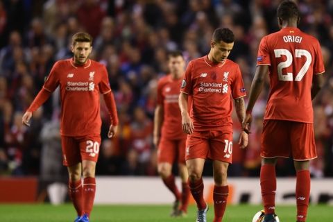 LIVERPOOL, ENGLAND - OCTOBER 22:  Dejected Liverpool players react after conceding the opening goal during the UEFA Europa League Group B match between Liverpool FC and Rubin Kazan at Anfield on October 22, 2015 in Liverpool, United Kingdom.  (Photo by Michael Regan/Getty Images)