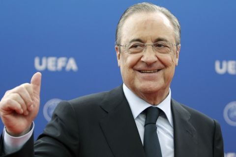 FILE - In this file photo dated Thursday, Aug. 30, 2018, Real Madrid President Florentino Perez gives a thumbs up as he arrives for the UEFA Champions League draw at the Grimaldi Forum, in Monaco. In a speech during Real Madrids most recent general assembly, president Florentino Perez answered questions from club members, and when asked about plans to create a womens team, Perez didnt answer. (AP Photo/Claude Paris, FILE)