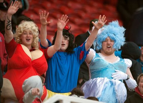 Charlton Athletic fans in fancy dress in the stands