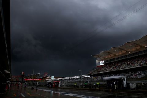AUSTIN, TX - OCTOBER 23:  Storm clouds form over the pit lane after the afternoon practice session was suspended due to weather ahead of the United States Formula One Grand Prix at Circuit of The Americas on October 23, 2015 in Austin, United States.  (Photo by Mark Thompson/Getty Images)